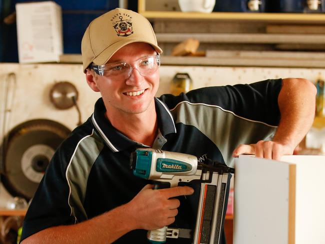 A<s1>pprentice carpenter Matt Ellison at work at Territory business Invision NT. Invision’s owner Deanne Claydon says that the way the Government’s Home Improvement Scheme </s1>is being implemented is proving to be a ‘huge problem’ for her business and customers. Picture: Glenn Campbell