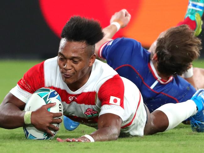 CHOFU, JAPAN - SEPTEMBER 20: Kotaro Matsushima of Japan scores his team's fourth try during the Rugby World Cup 2019 Group A game between Japan and Russia at the Tokyo Stadium on September 20, 2019 in Chofu, Tokyo, Japan. (Photo by Mike Hewitt/Getty Images)