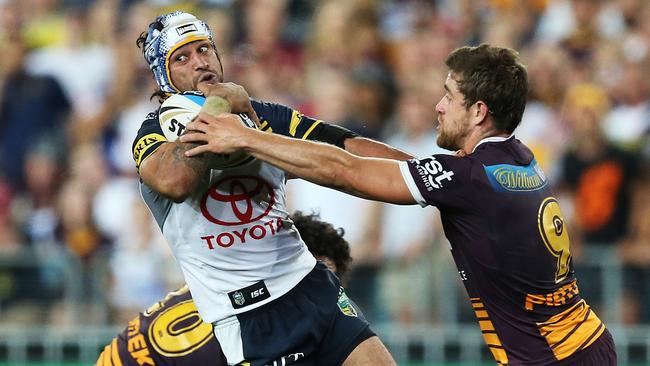 Johnathan Thurston keeps the ball alive on the last play to set up the Cowboys’ thrilling finish during the 2015 NRL Grand Final. Picture: Phil Hillyard