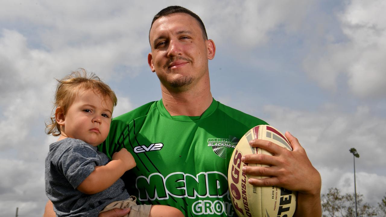 Cade Maloney, with son Lenny, 18 months, will be the first Townsville Blackhawk to sign with the South Sydney Rabbitohs under the club's landmark agreement with the QRL club. Picture: Evan Morgan