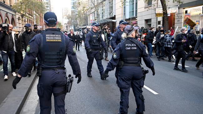 Protesters march through Sydney's CBD disrupting the traffic as part of Blockade Australia protests on June 27. Picture: Jeremy Piper,