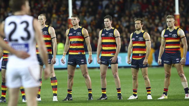 Adelaide Crows players stare down GWS during the national anthem of the qualifying final at Adelaide Oval. Picture: Sarah Reed