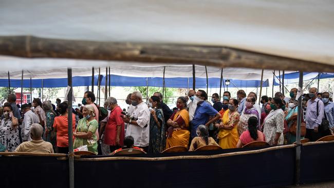 People line up to receive their Covid-19 vaccines at a mass vaccination centre in Mumbai, India. Picture: Getty