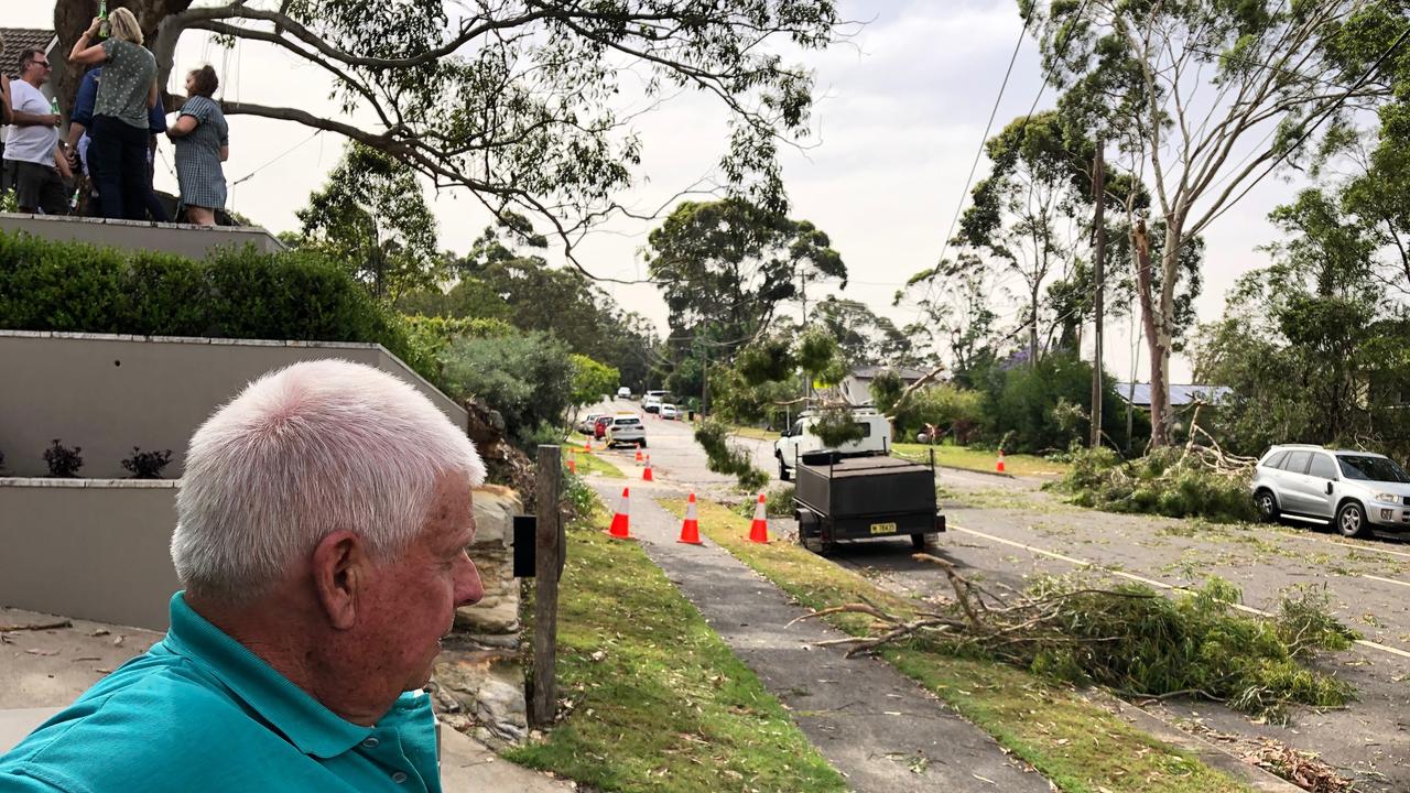 A man escapes his ute safely after 11,000 volt powerline falls onto his ute. Picture: Jim O'Rourke.