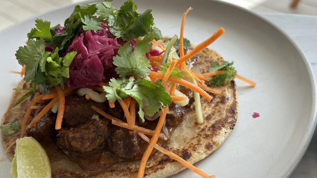 Beef rendang on grilled roti is Tarte Beach House’s satisfying twist on a taco.