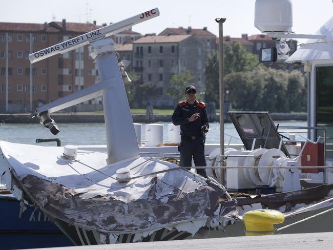 An Italian Coast Guard officer inspects the wreckage of the River Countess. Picture: AP