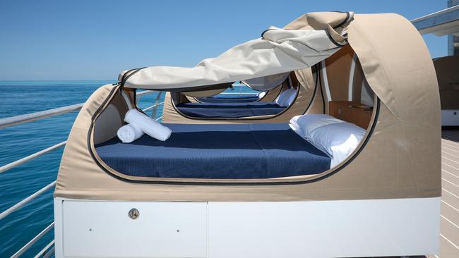 The luxury beds on the deck of the pontoon at Hardy Reef.