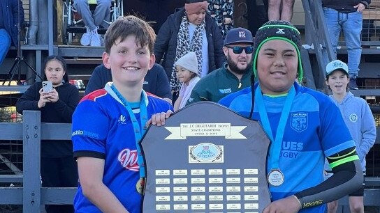 The winning Two Blues and Manly captains at the state championships. Pic: Supplied.