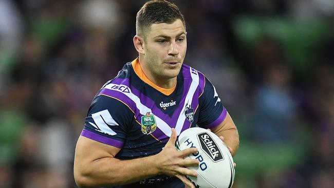 Ryley Jacks of the Storm in action against the Knights. Photo: AAP