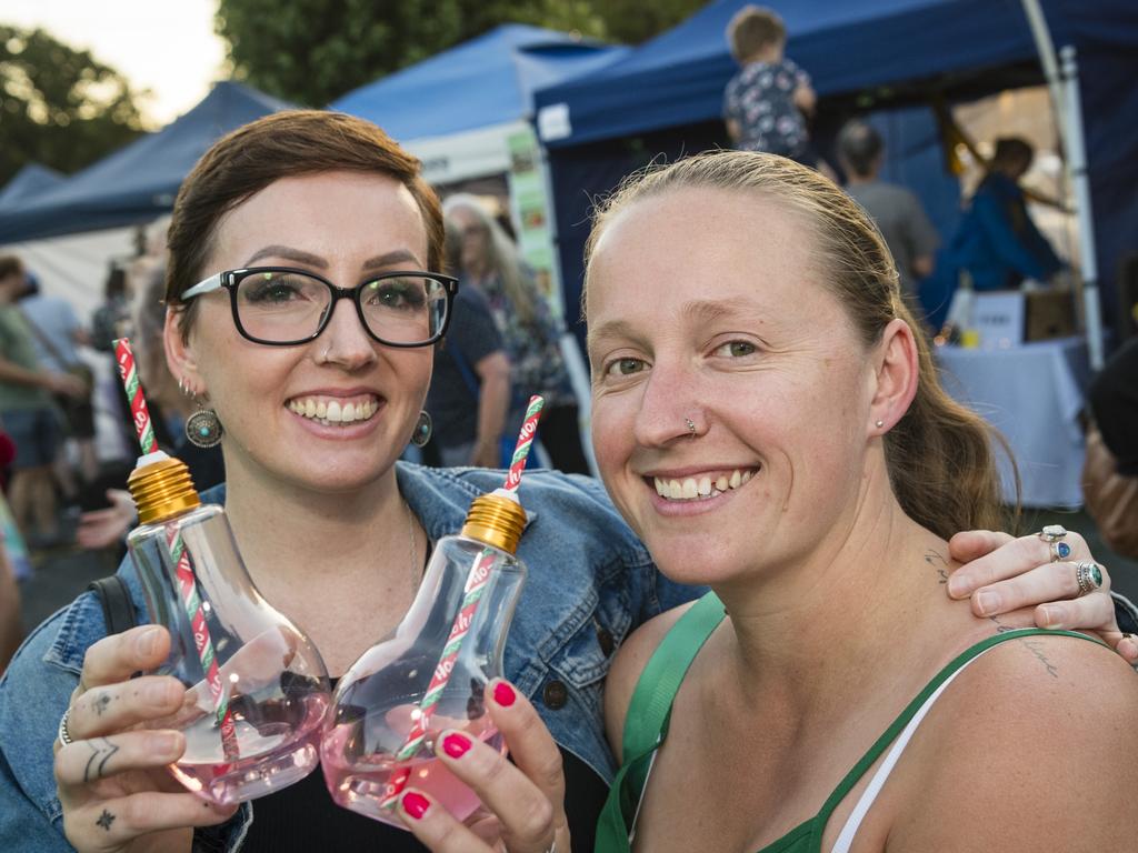 Harmony Greet (left) and Tabitha Turner enjoy light bulb lemonades at Twilight Eats at the Windmills, Saturday, November 18, 2023. Picture: Kevin Farmer