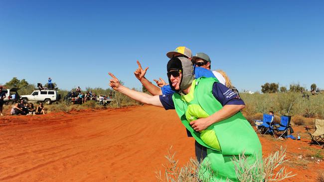 Spectators at Finke Desert Race in 2013. Under new rules, spectators will now need to be a minimum of 30m from the track, with some sections of the track becoming spectator exclusion zones.