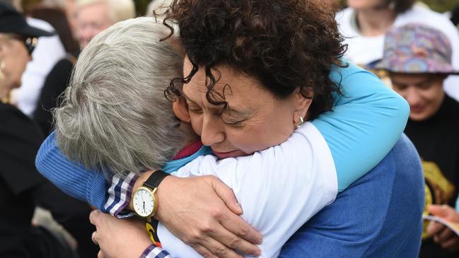 Yes volunteers console each other after the loss on the weekend.