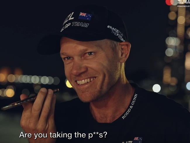 Nathan Outteridge stitches up his wife. Photo: Racing On The Edge.
