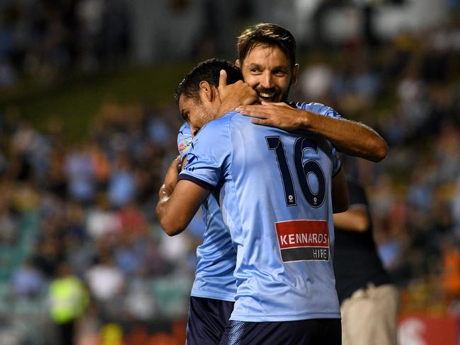 Reza Ghoochannejhad (right) and Milos Ninkovic celebrate a rare goal in recent weeks. 