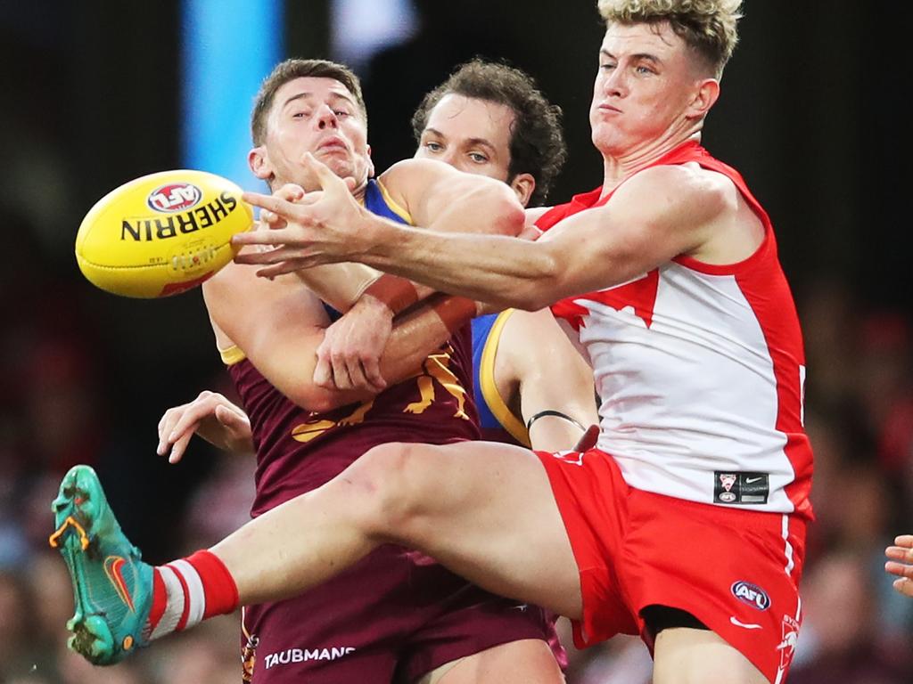 Brisbane’s Dayne Zorko tangles with Chad Warner of the Swans at the SCG. Picture: Matt King/AFL Photos/via Getty Images