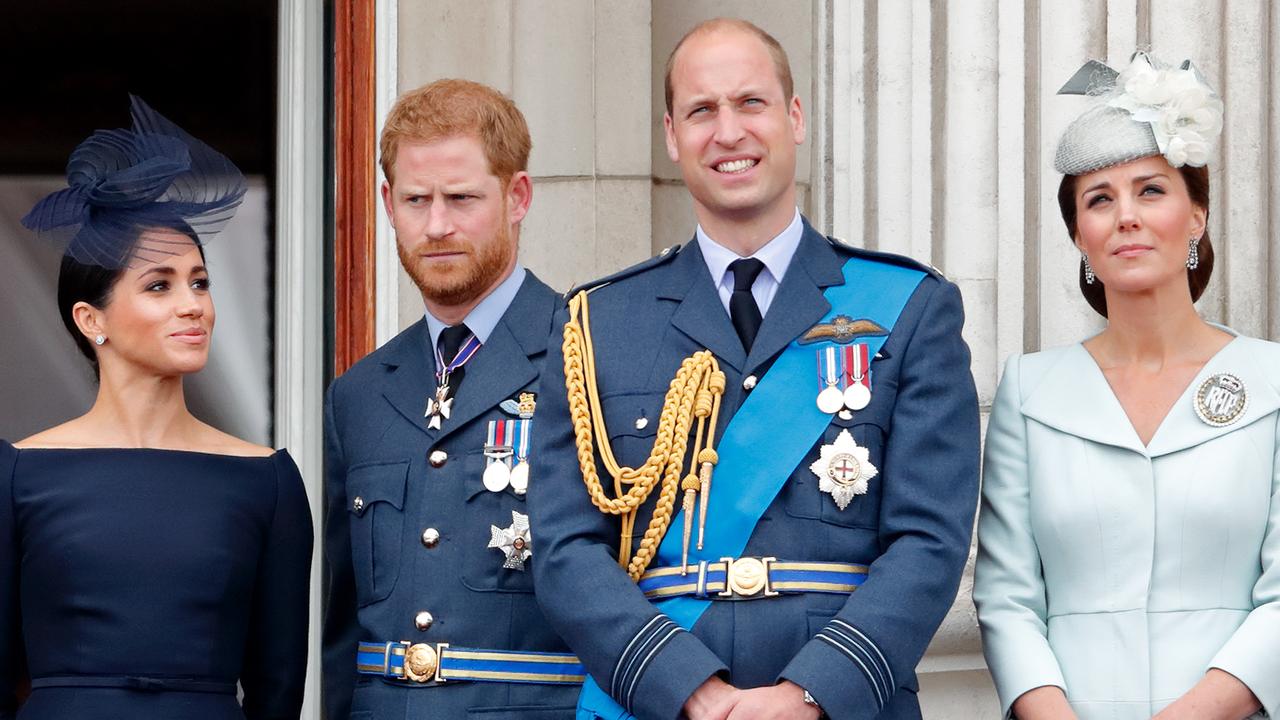 LONDON, UNITED KINGDOM - JULY 10: (EMBARGOED FOR PUBLICATION IN UK NEWSPAPERS UNTIL 24 HOURS AFTER CREATE DATE AND TIME) Meghan, Duchess of Sussex, Prince Harry, Duke of Sussex, Prince William, Duke of Cambridge and Catherine, Duchess of Cambridge watch a flypast to mark the centenary of the Royal Air Force from the balcony of Buckingham Palace on July 10, 2018 in London, England. The 100th birthday of the RAF, which was founded on on 1 April 1918, was marked with a centenary parade with the presentation of a new Queen's Colour and flypast of 100 aircraft over Buckingham Palace. (Photo by Max Mumby/Indigo/Getty Images)