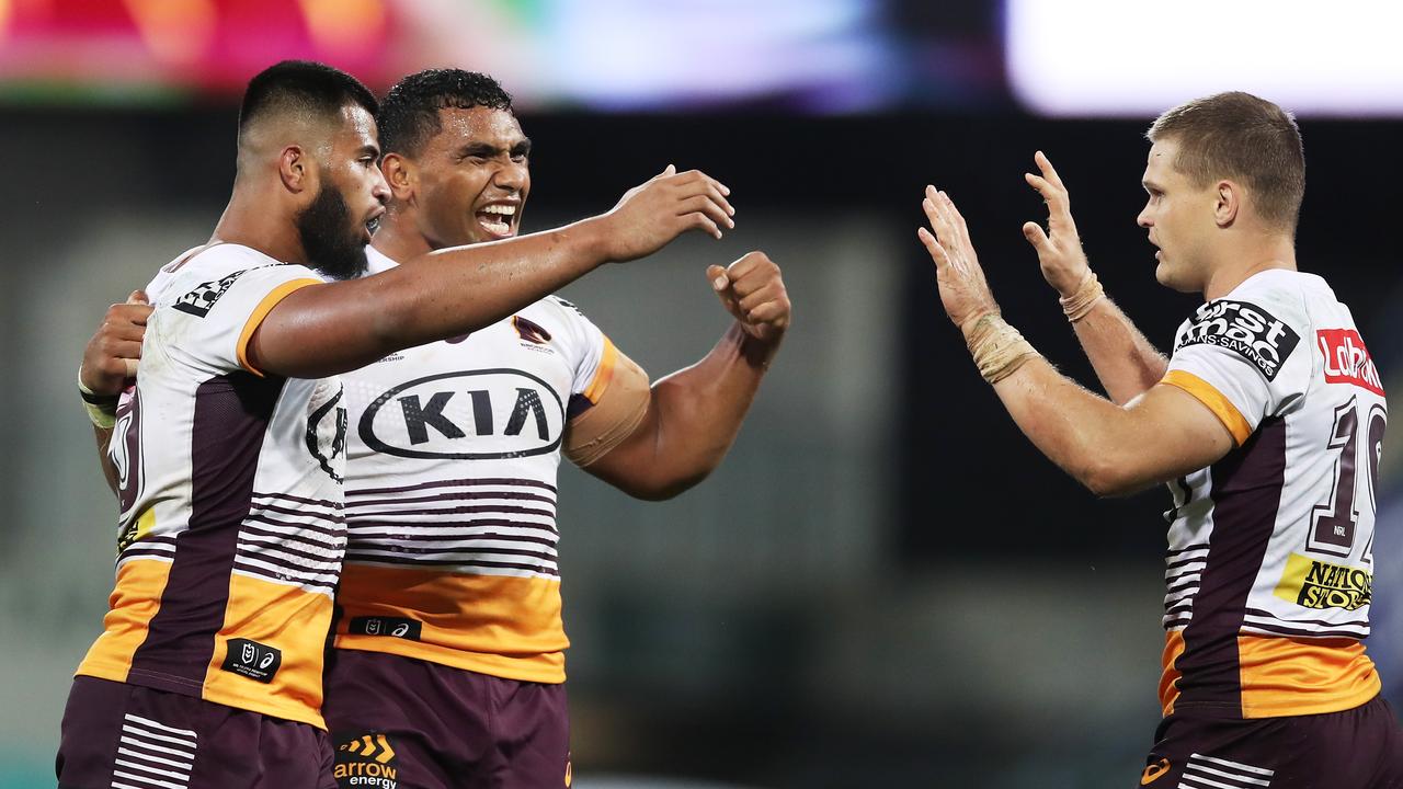 SYDNEY, AUSTRALIA - MAY 22: Payne Haas (L) and Tevita Pangai Junior (C) of the Broncos celebrate with Dale Copley (R) during the round 11 NRL match between the Sydney Roosters and the Brisbane Broncos at Sydney Cricket Ground, on May 22, 2021, in Sydney, Australia. (Photo by Matt King/Getty Images)