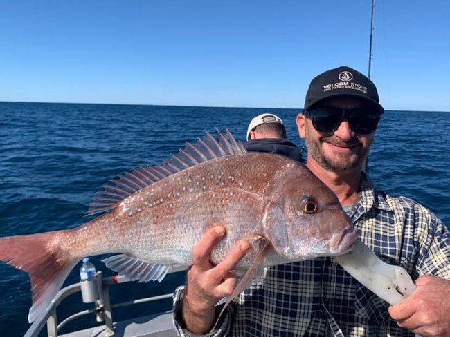 Micah on Silver Star with his best snapper for the day.