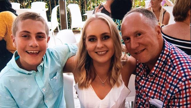 Timothy, pictured with his older sister, Emma and dad Dale, has been described as a bubbly boy who was not the type to make a fuss. Picture: Supplied