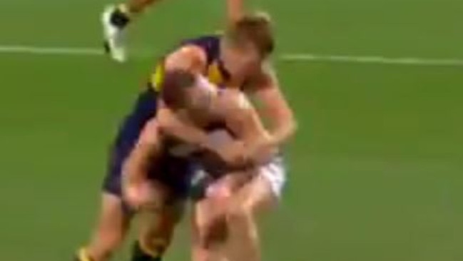 Sam Mitchell retaliates against Joel Selwood. Picture: Channel 7