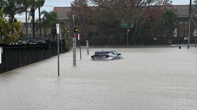 Flooding on Ashford Rd, Milperra, less than 100 metres from Kwik Kopy, and Kilmac Civil Engineering.