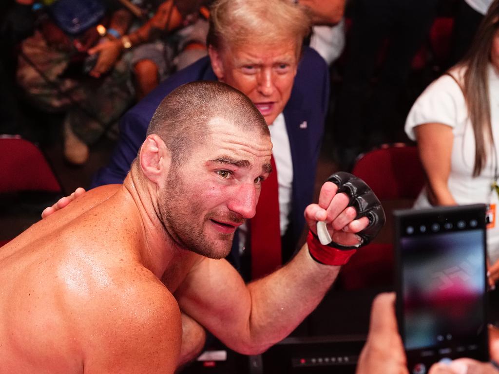 Strickland celebrates his win over Paulo Costa with President Donald Trump. Picture: Jeff Bottari/Zuffa LLC via Getty Images