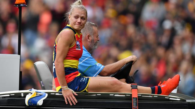 Erin Phillips is helped from Adelaide Oval on the medicab after tearing her ACL.