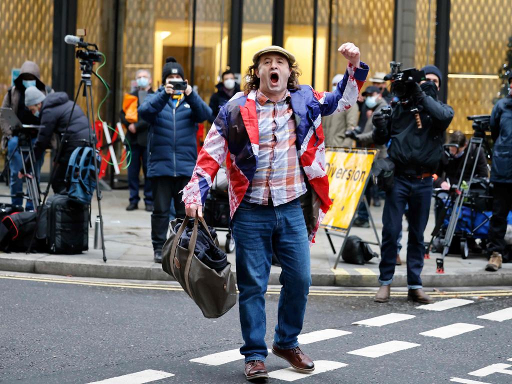 Supporters of WikiLeaks founder Julian Assange demonstrate outside the Old Bailey before the ruling. Picture: AFP