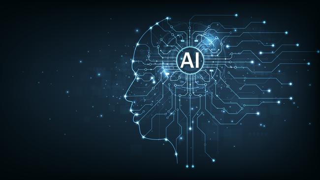 Electronic brain and Concept of artificial intelligence(AI).Graphic of a digital brain and Human head outline made from circuit board, connecting on dark blue background.