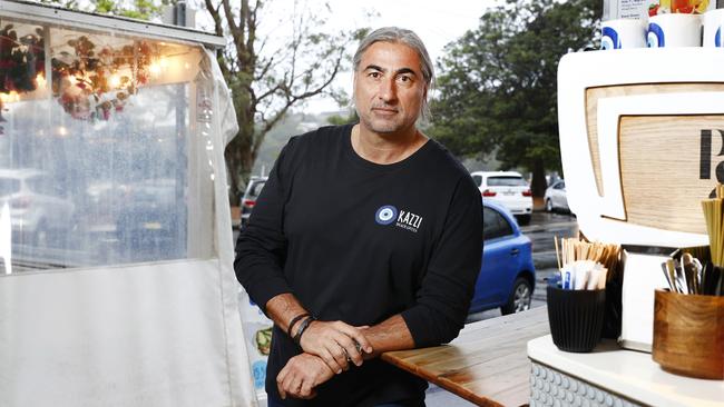 Pictured at Balmoral Beach in Sydney is Peter Papas who owns Kazzi Beach Greek opposite the beach. Picture: Richard Dobson