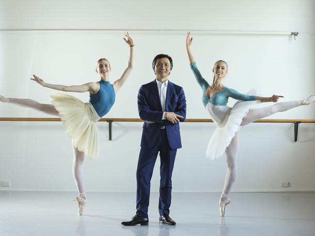 Queensland Ballet director Li Cunxin with dancers Hannah Clark and Josie Frick