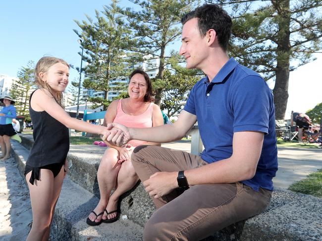 LNP candidate for Bonney Sam O'Connor at Harley Park Labrador. The seat is tight, Sam is in front at the moment but by less than 300 votes. He met Hannah Renwick (9) who asked her mum to vote for him and was star struck when they bumped into eachother at the park. Her mum is Nicole Renwick on 0435367638Photo by Richard Gosling