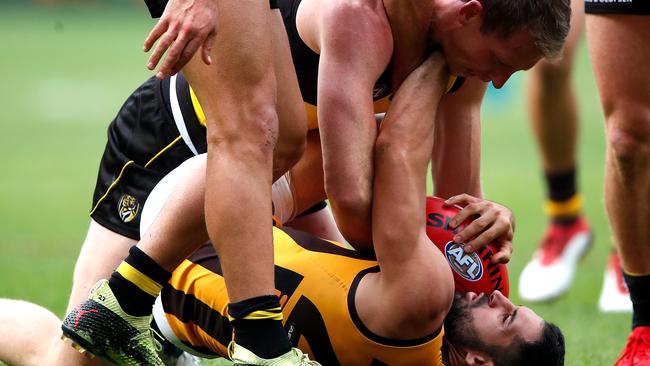 Tiger Dylan Grimes wasn’t happy with Paul Puopolo after the Hawk received a free kick for a high tackle. Pic: Getty Images