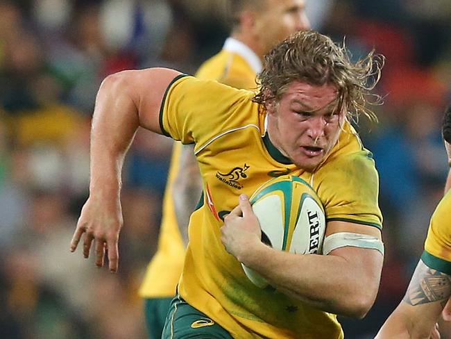 BRISBANE, AUSTRALIA - JULY 18: Michael Hooper of the Wallabies runs the ball during The Rugby Championship match between the Australian Wallabies and the South Africa Springboks at Suncorp Stadium on July 18, 2015 in Brisbane, Australia. (Photo by Chris Hyde/Getty Images)
