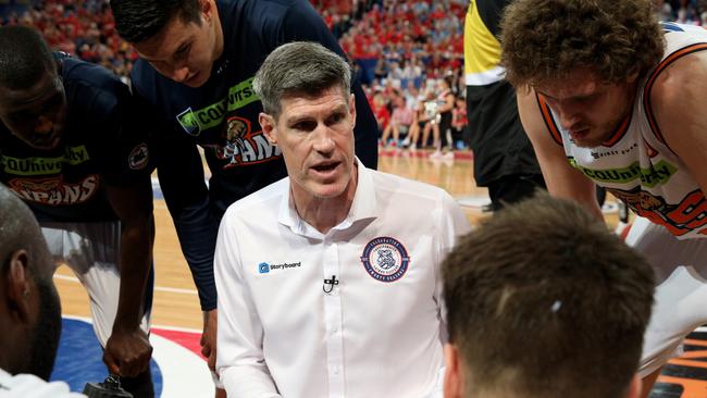 Head coach of the Cairns Taipans, Mike Kelly speaks to his players during the Round 8 NBL match between Perth Wildcats and Cairns Taipans at Perth Arena in Perth, Sunday, December 9, 2018. (AAP Image/Richard Wainwright) NO ARCHIVING, EDITORIAL USE ONLY