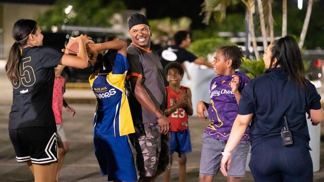 Annie (second from right) from Yarrabah plays basketball with her friends, Fire Project staff member Jackson Ahwang and EST staff member Janice Stratton at the FNQ Slam event. Picture: Hart Creative Co