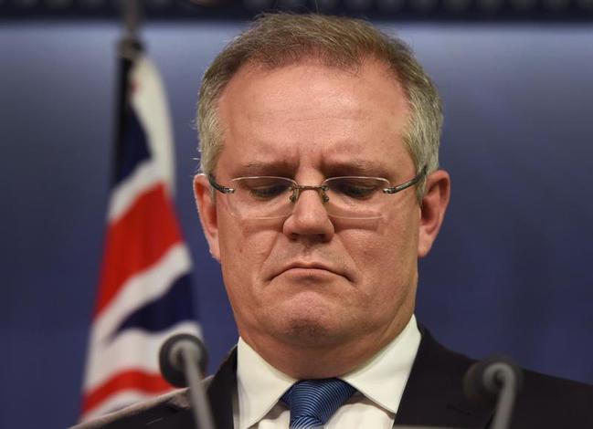 Treasurer Scott Morrison says cuts are necessary for tax relief. . Picture: AFP PHOTO - William West