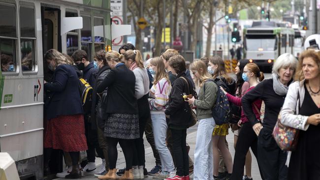 People squeezing onto a tram in Melbourne’s CBD on May 3. Picture: NCA NewsWire / David Geraghty