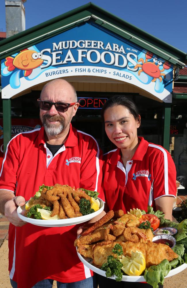 The winner of best fish and chips for 2017, Mudgeeraba Seafoods! Peter and Peisie Hawkes with some of their award-winning fare. Picture Glenn Hampson