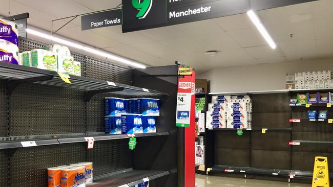 Supermarket shelves low on toilet paper at Woolworths in Narrabeen. Picture: Monique Harmer