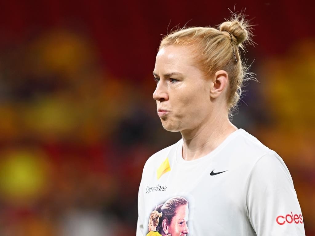 Clare Polkinghorne warming up before the ceremony. (Photo by Bradley Kanaris/Getty Images)