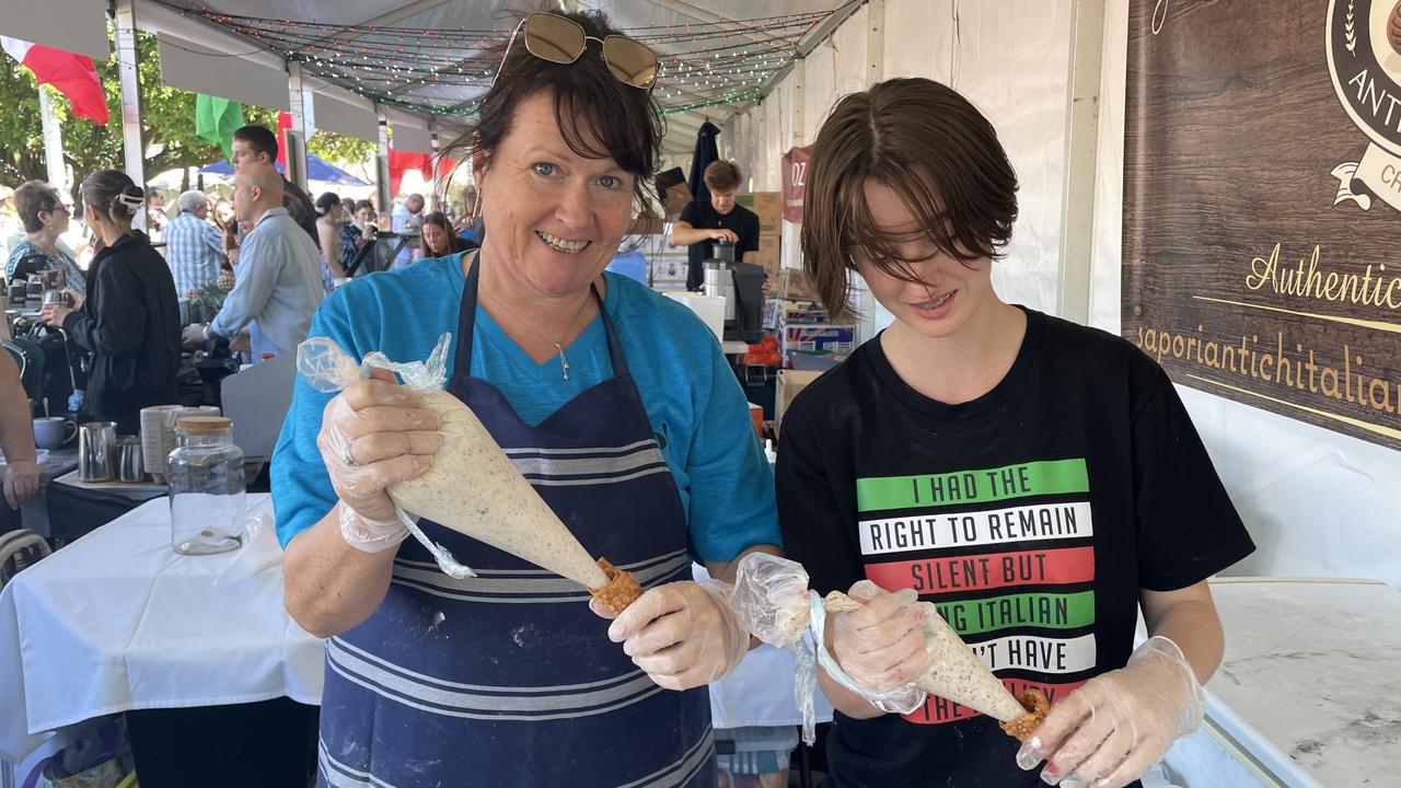 Diana Ealden and Grace Meyers preparing cannoli's for Sapori Antichi Italiani at the La Festa - Food and Wine day as part of Cairns Italian Festival at Fogarty Park. Picture: Andreas Nicola