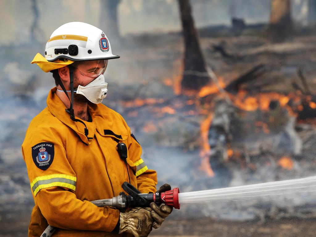 St Helens Bob Williams TFS Volunteers during back burning operations at Fingal. PICTURE CHRIS KIDD