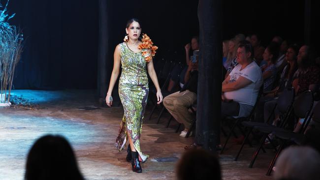 Lynette Gee Gee showcases the Green Love collection from designer Bernard Singleton at the Cairns Indigenous Art Fair fashion performance, Woven, held at the Tanks Arts Centre, Edge Hill. Picture: Brendan Radke