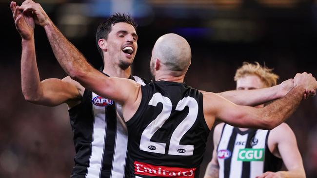 Steele Sidebottom of the Magpies celebrates a goal with Scott Pendlebury (left) during the First Qualifying Final between the Geelong Cats and the Collingwood Magpies during Week 1 of the AFL Finals Series at the MCG in Melbourne, Friday, September 6, 2019. (AAP Image/Michael Dodge) NO ARCHIVING, EDITORIAL USE ONLY