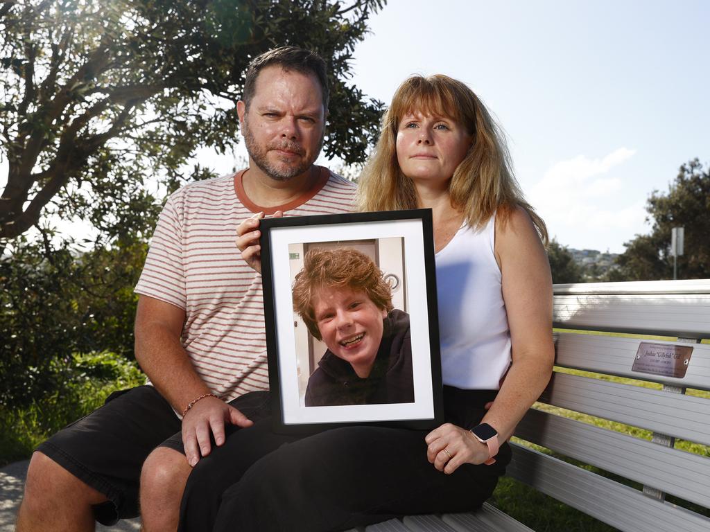 Andrew Gill and his wife Diana Gill holding a photo of their boy Josh, 14, who died in tragic circumstances. Picture: Richard Dobson