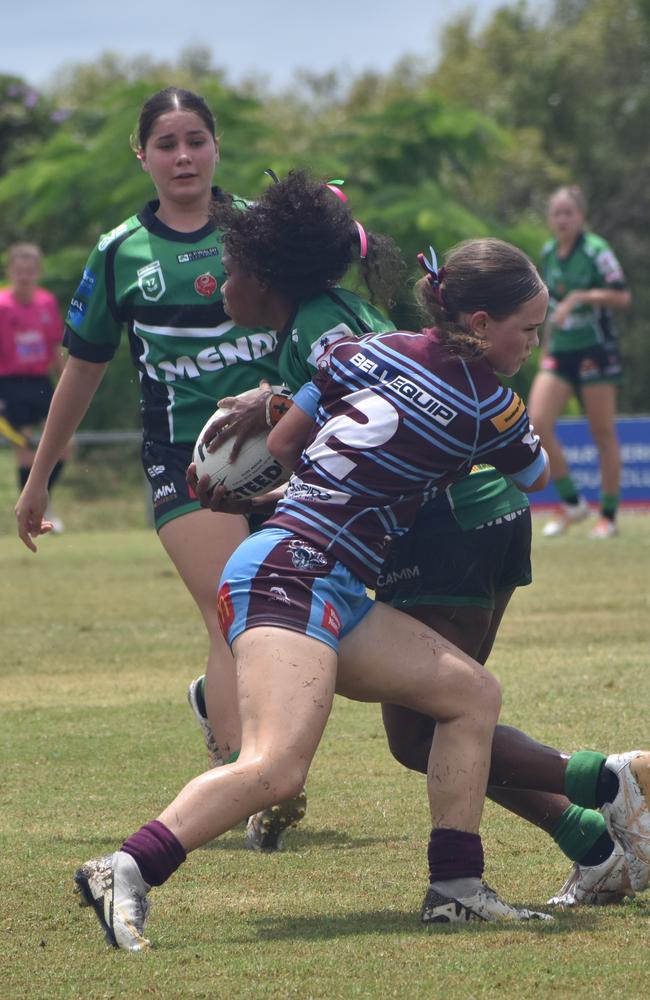 Winger Ashlynn Self muscles up in defence.