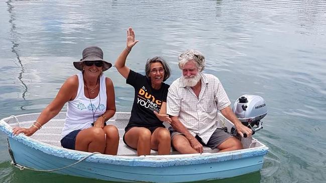 Andy Heard is presumed dead after a croc attack at Hinchinbrook Island. Pictured here with partner Eria Lang (centre). Picture: Supplied