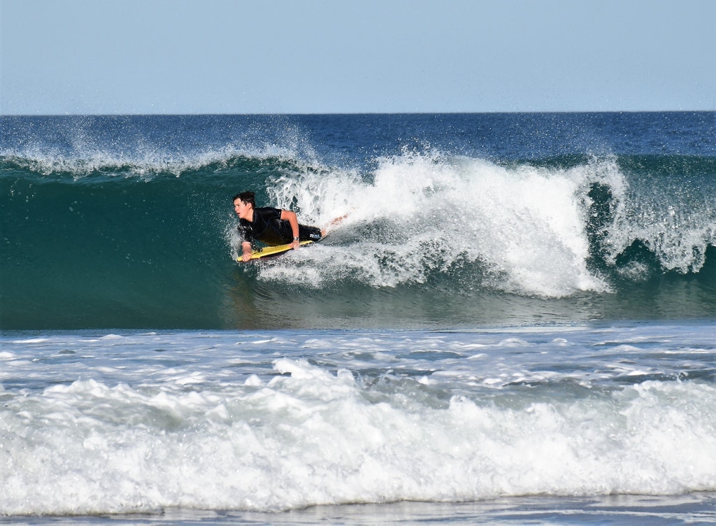 Surfers and bodyboard riders making the most of the waves at Kawana on the weekend. Picture: Mark Furler