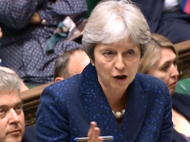 A video grab from footage broadcast by the UK Parliament's Parliamentary Recording Unit (PRU) shows Britain's Prime Minister Theresa May  speaking in the House of Commons on Brexit in London on July 9, 2018. British Prime Minister Theresa May's government imploded on July 9 as Foreign Secretary Boris Johnson followed Brexit minister David Davis out the exit door over her masterplan for Britain's future outside the EU. / AFP PHOTO / PRU / HO / RESTRICTED TO EDITORIAL USE - NO USE FOR ENTERTAINMENT, SATIRICAL, ADVERTISING PURPOSES - MANDATORY CREDIT " AFP PHOTO / PRU "